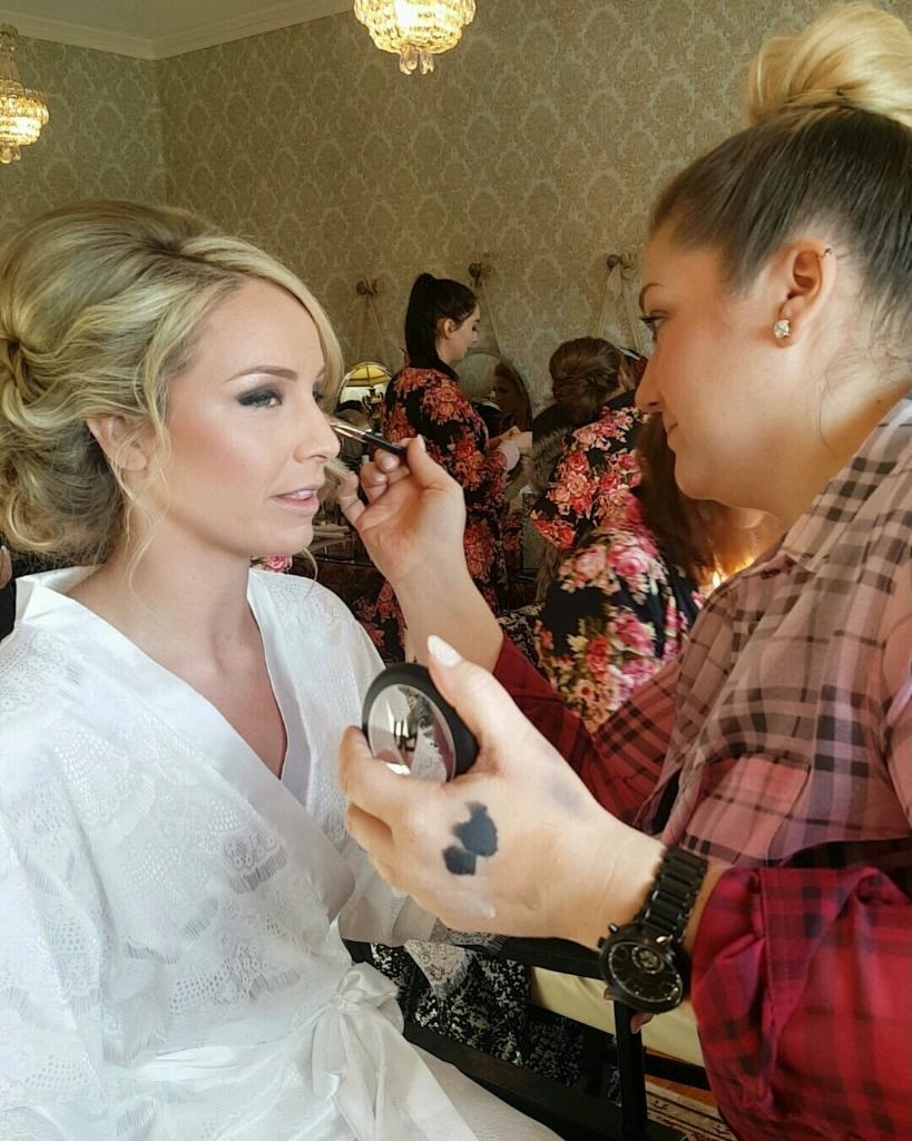 Mandi Chamblee doing bridal makeup